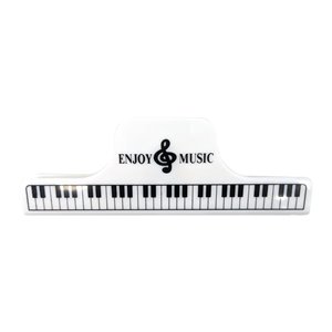 Pinza blanca teclado piano